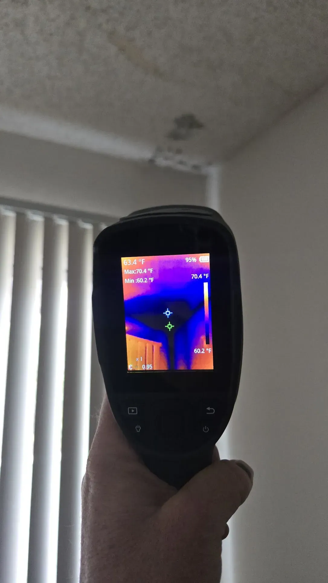Thermal imaging camera detecting moisture anomalies during a mold inspection
